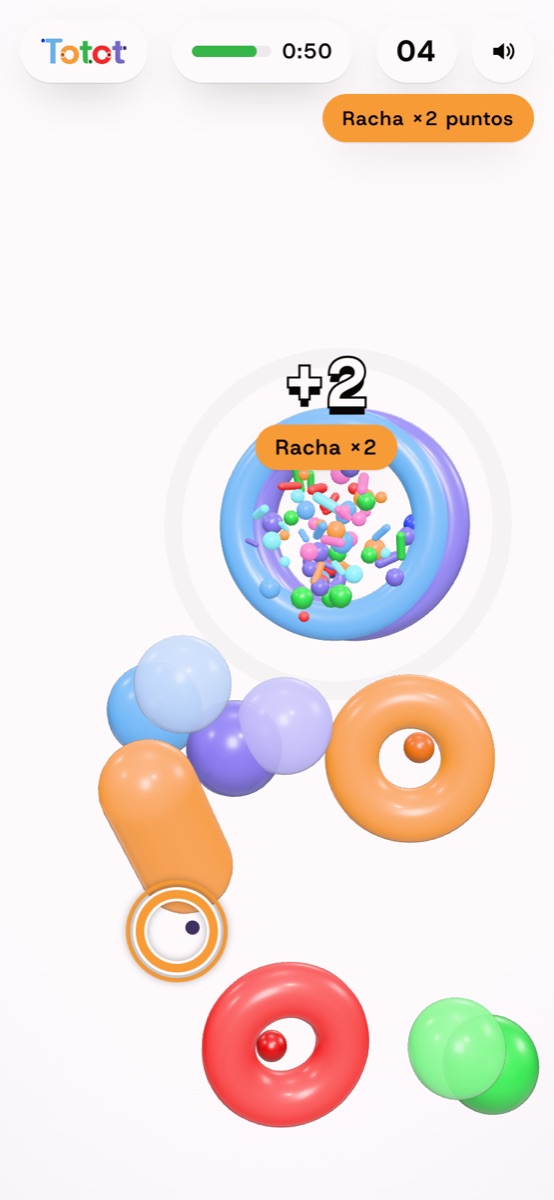 Acierto en el celular: confeti dentro de la O y «+2, Racha ×2».